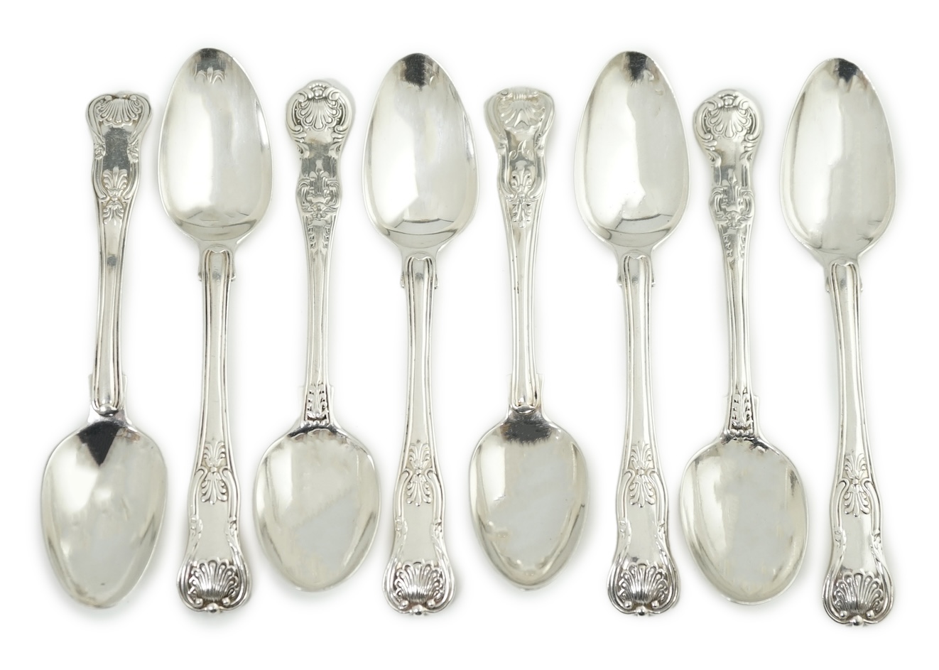 A harlequin set of eight Georgian and Victorian silver Kings pattern teaspoons, various dates and makers